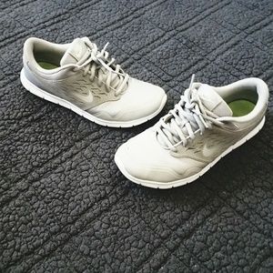Gray Nike running shoes